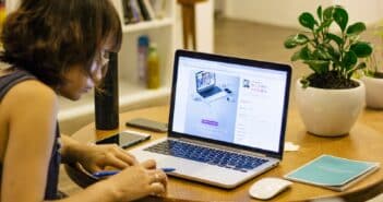 woman browsing on her laptop