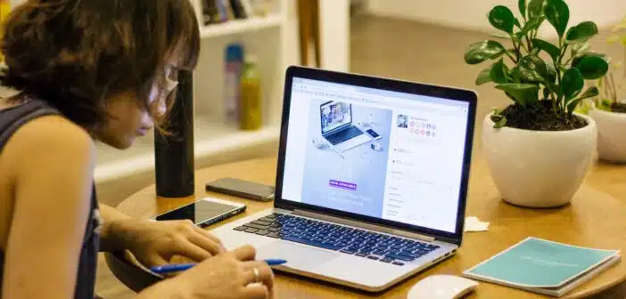 woman browsing on her laptop